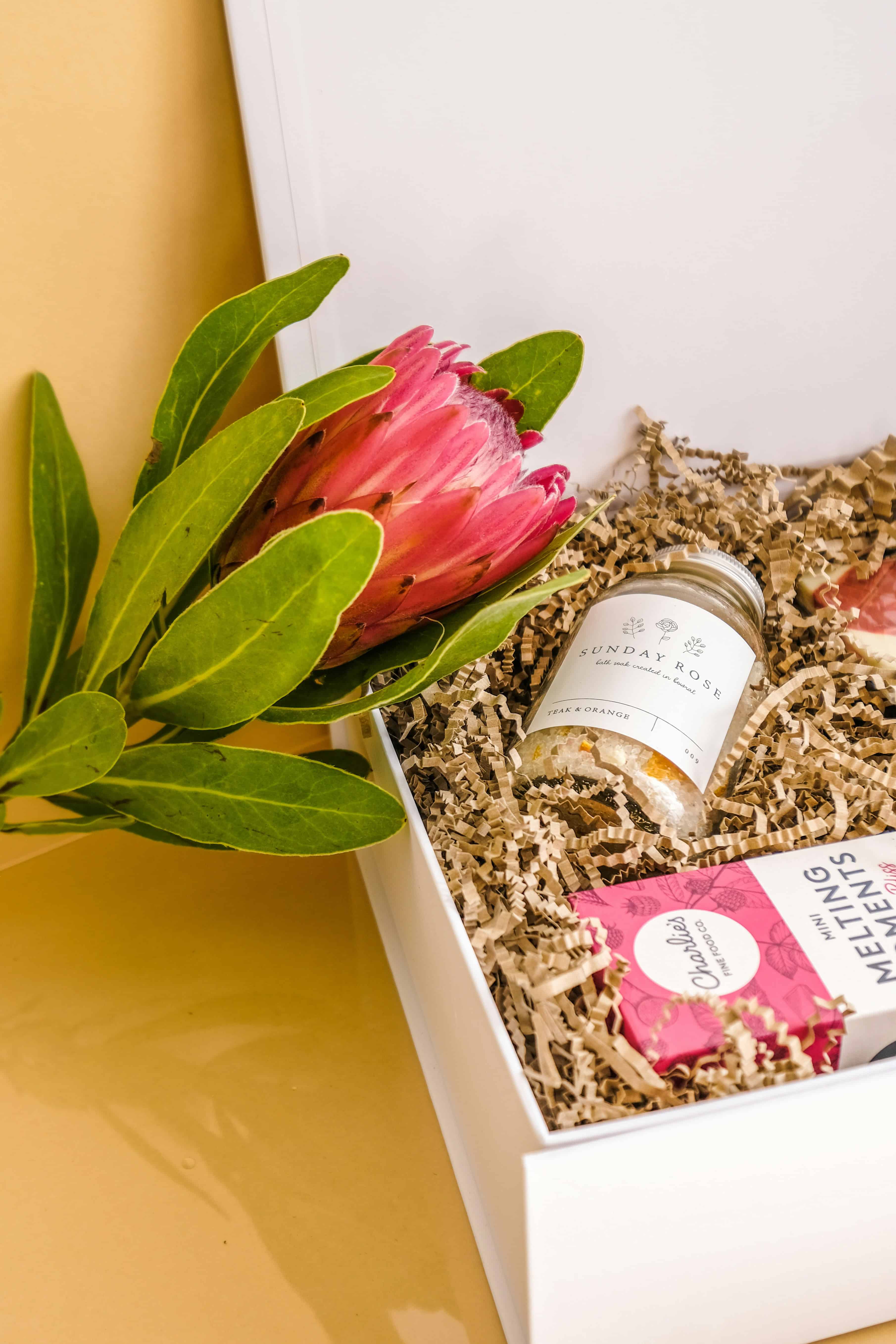 A beautifully curated gift box with various local products.